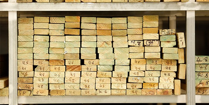 Piles of timber in warehouse